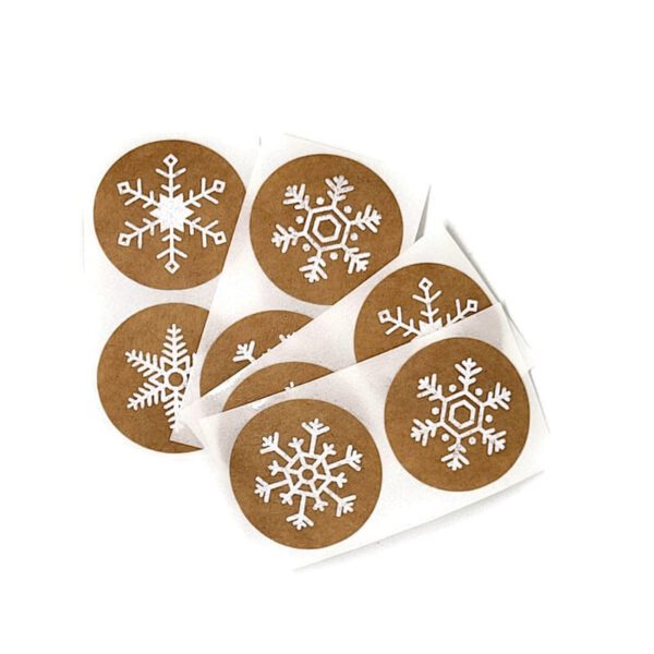 Sticker bruin met sneeuwvlokjes (25mm)